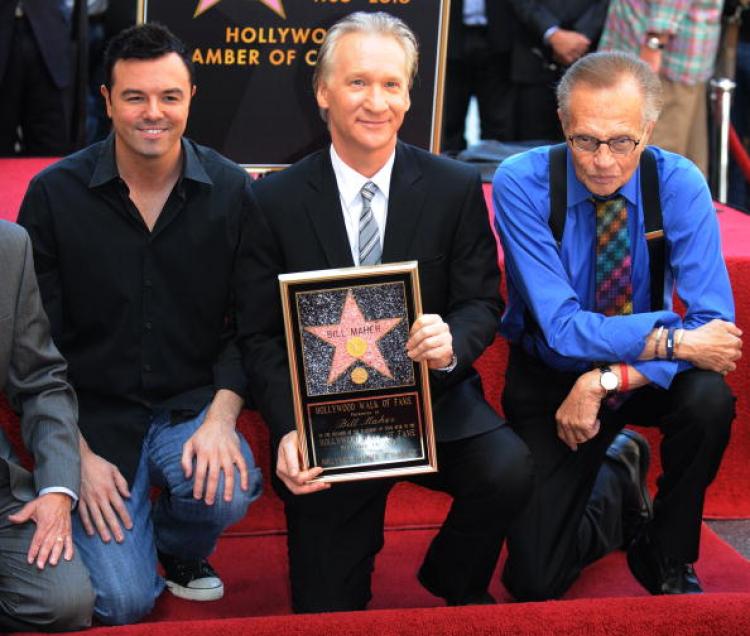 Bill Maher (C) is joined by animator Seth MacFarlane (L) and TV host Larry King (R) as he poses with copy of the star at the ceremony to unveil his Hollywood Walk of Fame star in Hollywood on September 14. (Mark Ralston/Getty Images )