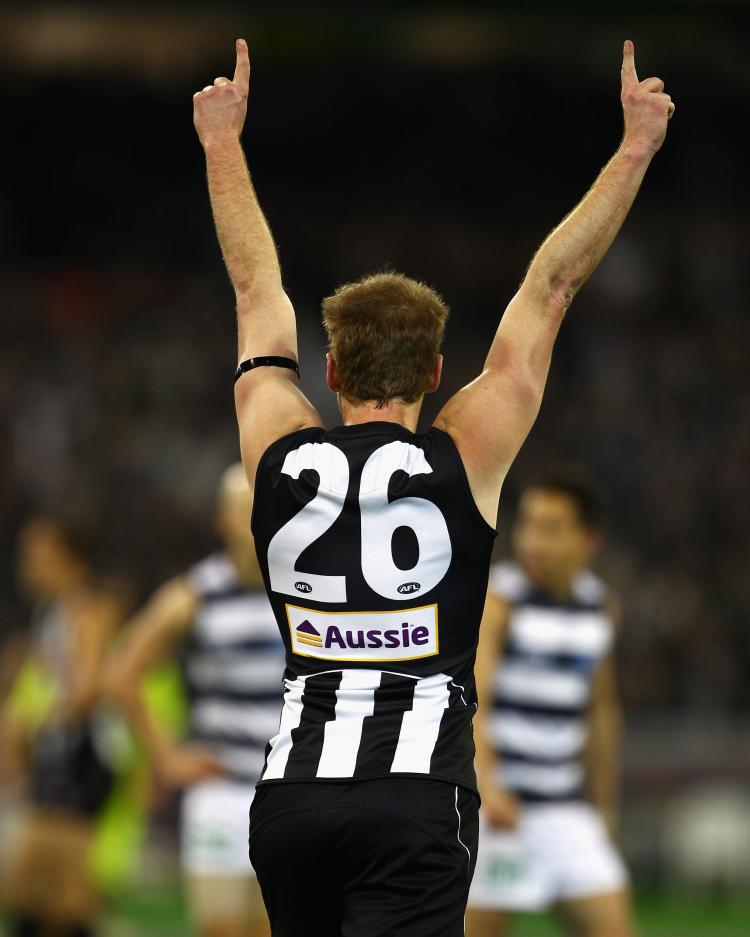 Ben Johnson of the Magpies celebrates kicking a goal during the First AFL Preliminary Final between the Collingwood Magpies and the Geelong Cats at Melbourne Cricket Ground on September 17 in Melbourne. (Mark Dadswell/Getty Images)