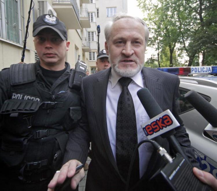 Ahmed Zakayev, the exiled Chechen independence leader Akhmed Zakayev, is escorted by police after on September 17. A Polish court decided to free Zakayev just after a couple days after his arrest.  (Darek Redos/Getty Images )