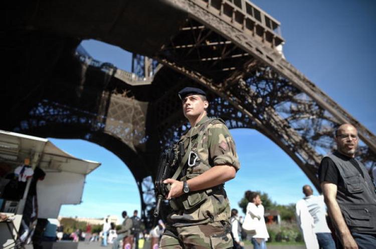 A French Army soldier is on patrol as part of France's national security alert system Vigipirate at the Eiffel Tower in Paris, on September 20.  (Fred Dufour/Getty Images)