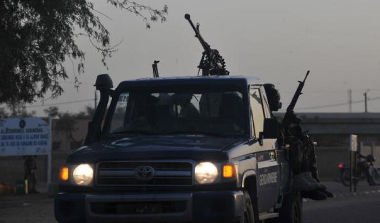 Nigerian army patrolmen drive along a road in northern Niger, on September 24, one week after the kidnapping by the Al-Qaeda of a group of expatriate workers employed by the French group Areva.  (Issoup Sanogo/Getty Images )