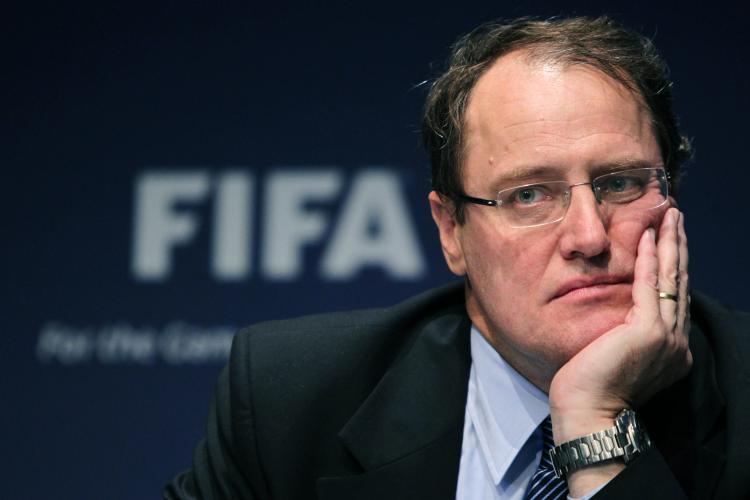 FIFA's Ethics Committee Chairman Claudio Sulser listens to a question during a media conference of the World Soccer Association FIFA in Zurich, on Oct. 20, following his announcement that the committee was banning six FIFA officials for breach of ethics.  (Sebastian Derungs/AFP/Getty Images)