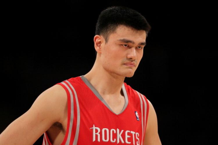 Yao Ming #11 at an opening night game against the Los Angeles Lakers, at Staples Center, on Oct. 26, in Los Angeles, California.  (Jeff Gross/Getty Images)