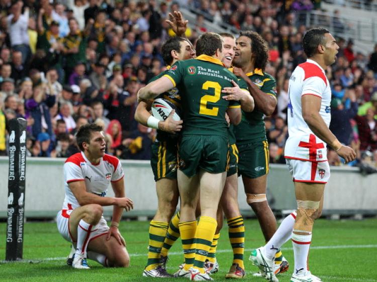 Billy Slater of Australia celebrates his try with teammates during the Four Nations match between the Australian Kangaroos and England at AMMI Park on Oct. 31, in Melbourne. (Robert Cianflone/Getty Images)
