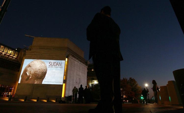 Images from South Sudan are projected onto the exterior of the United States Holocaust Memorial Museum November 8, in Washington, DC. The images are part of a new program at the museum.  (Win McNamee/Getty Images)