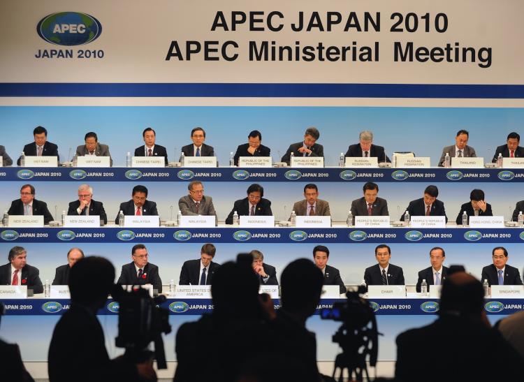 Ministers prepare for a press conference after a plenary session meeting in Yokohama on Nov. 11, ahead of APEC summit this week. (Alexander Nemenov/AFP/Getty Images)