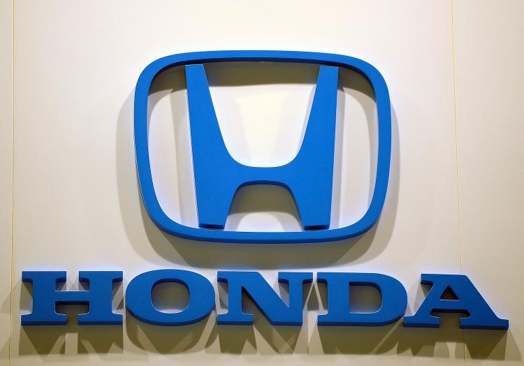 The Honda logo. Honda is recalling 35,000 Passport SUVs due to suspension brackets that risk failure after salt corrosion.