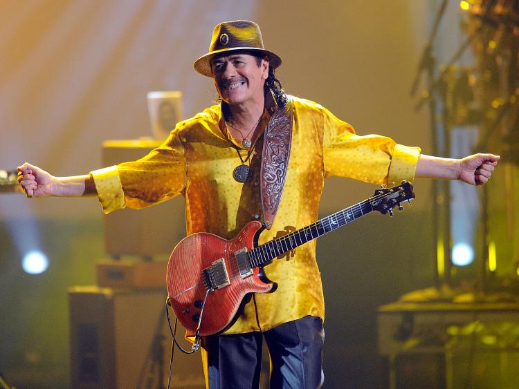 Carlos Santana performs onstage during the 2010 American Music Awards held at Nokia Theatre L.A. Live on November 21, 2010 in Los Angeles, California. (Kevork Djansezian/Getty Images)