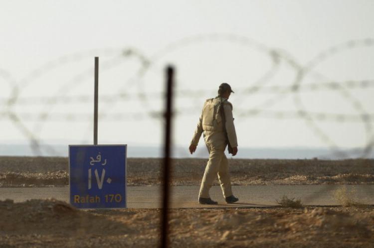 An Egyptian soldier on the Egyptian side of its border with Israel, on Nov. 22.  (David Buimovitch/AFP/Getty Images)