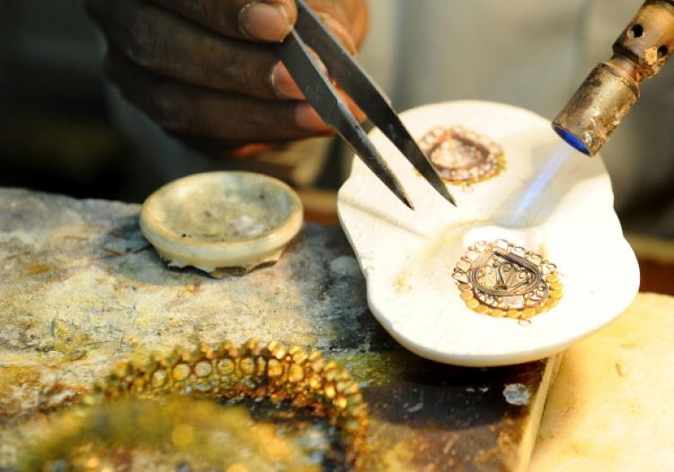 The counterfeiting of gold comes at a time when gold prices are soaring. (Arif Ali/AFP/Getty Images)