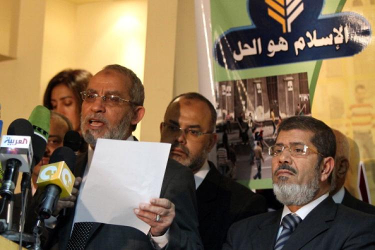 Mohammed Badie (L), the head of Egypt's Muslim Brotherhood, holds a press conference.  (Khaled Desouki/AFP/Getty Images)