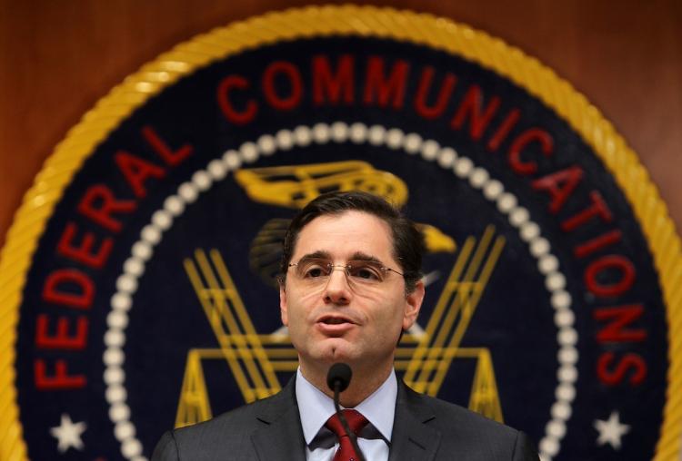 U.S. Federal Communications Commission Chairman Julius Genachowski speaks to the media on December 1, at the headquarters of the FCC in Washington, DC. (Alex Wong/Getty Images) U.S. Federal Communications Commission Chairman Julius Genachowski speaks to the media on December 1, at the headquarters of the FCC in Washington, DC. (Alex Wong/Getty Images)