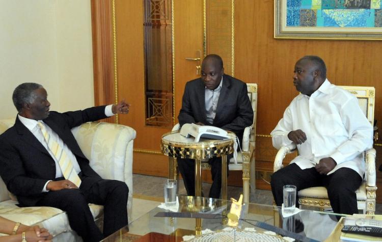 Former South African president Thabo Mbeki (L) meets with Ivory Coast incumbent Laurent Gbagbo (R) at the presidential residence in Abidjan on December 5. (Seyllou/Getty Images )