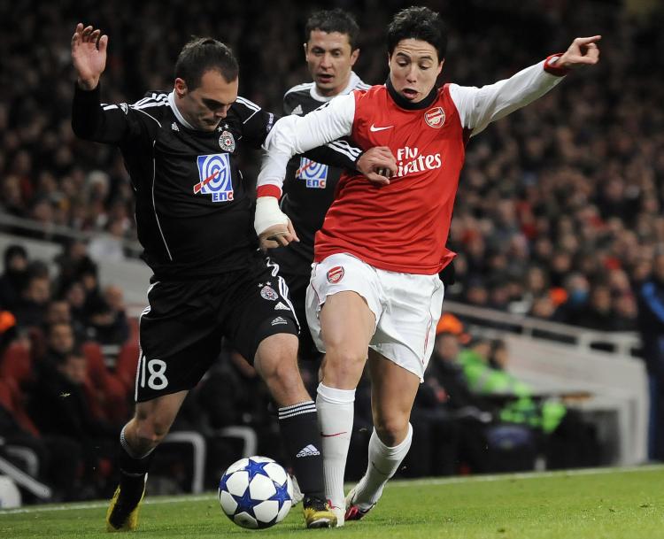 Arsenal's Samir Nasri led the charge for the Gunners in their victory over Partizan Belgrade in Wednesday's Champions League group stage finale. (Carl de Souza/AFP/Getty Images)