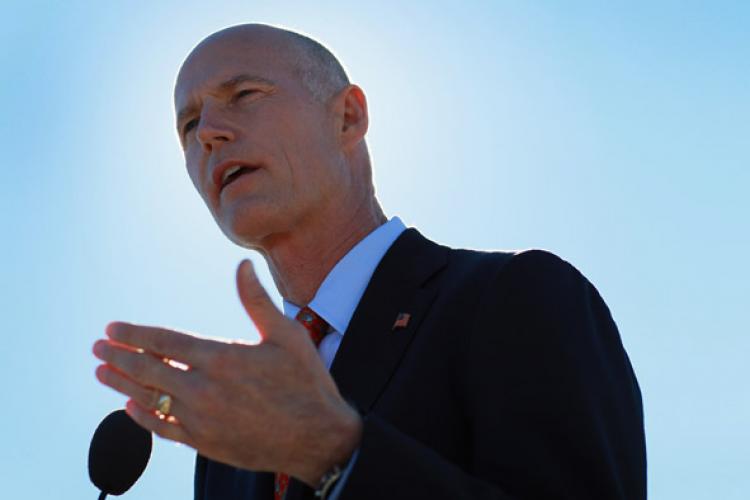 Florida Governor-elect Rick Scott speaks at a press conference on the Port of Miami on December 8, 2010 in Miami, Florida. Scott announced on Feb. 16 that after careful consideration he has decided to reject President Obama's plan for a high-speed rail project that would link Tampa to Orlando. (Joe Raedle/Getty Images)