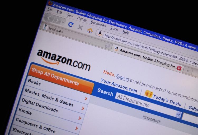 Amazon.com Inc. is planning on releasing a new tablet computer and two new versions of its Kindle e-book reader in the third quarter before October. (Karen Bleier/AFP/Getty Images)