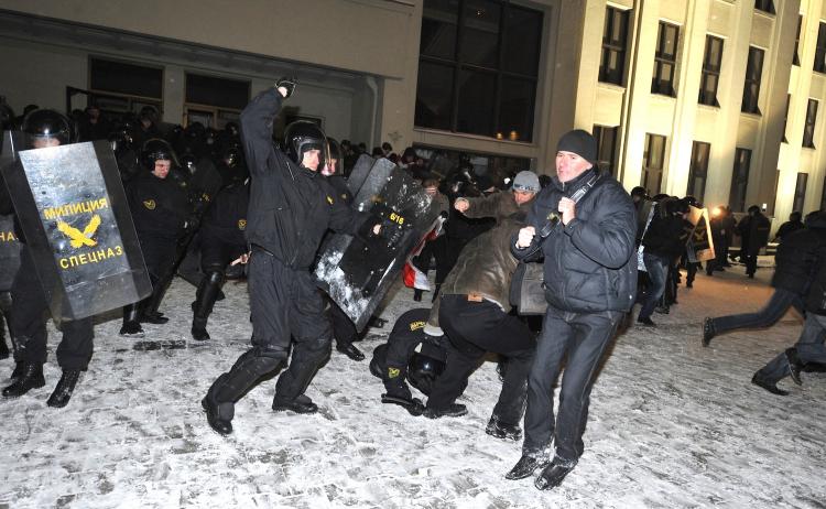 QUESTIONED ELECTION: Protesters clash with riot police during an opposition rally in Minsk early on Dec. 20. Belarus police arrested hundreds of protesters as they used force to break up a mass demonstration against the expected re-election of President Alexander Lukashenko in disputed polls on Sunday. (Viktor Drachev/Getty Images ) QUESTIONED ELECTION: Protesters clash with riot police during an opposition rally in Minsk early on Dec. 20. Belarus police arrested hundreds of protesters as they used force to break up a mass demonstration against the expected re-election of President Alexander Lukashenko in disputed polls on Sunday. (Viktor Drachev/Getty Images )