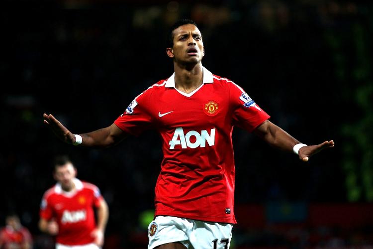 Manchester United's Nani settles the issue at Old Trafford on Tuesday against Stoke City.  (Clive Brunskill/Getty Images)