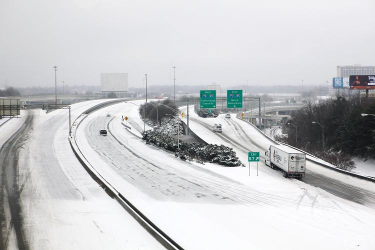 A snowy and icy view of I-20 in Atlanta is visible from a Marta train after a snow storm on January 10, 2011 in Atlanta, Georgia.  (Jessica McGowan/Getty Images)