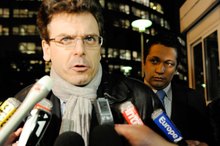 DEFENSE: Thibault de Moutbrial (L), lawyer for one of three top managers of French carmaker Renault suspected of industrial espionage, Matthieu Tenenbaum (R), answers to journalists before a meeting with Renault bosses.  (Bertrand Guay/AFP/Getty Images)