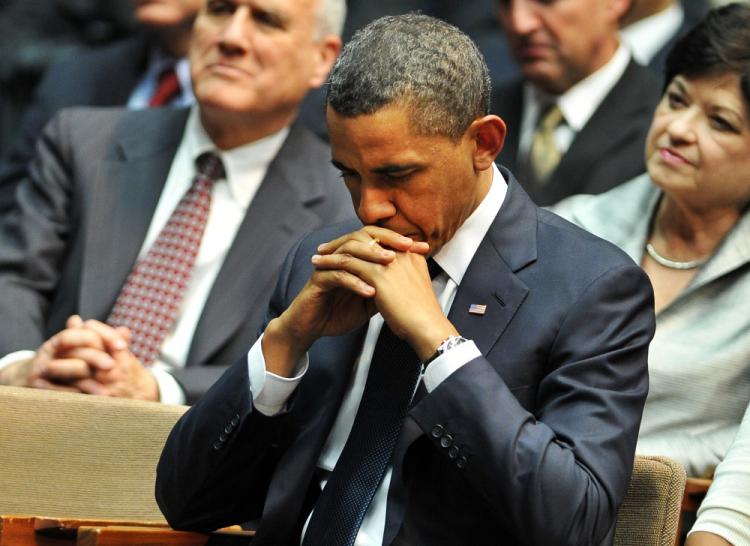 US President Barack Obama attends the memorial event, Together We Thrive: Tucson and America, at the McKale Memorial Center in Tucson, Arizona, on January 12, 2011. (Jewel Samad/AFP/Getty Images)