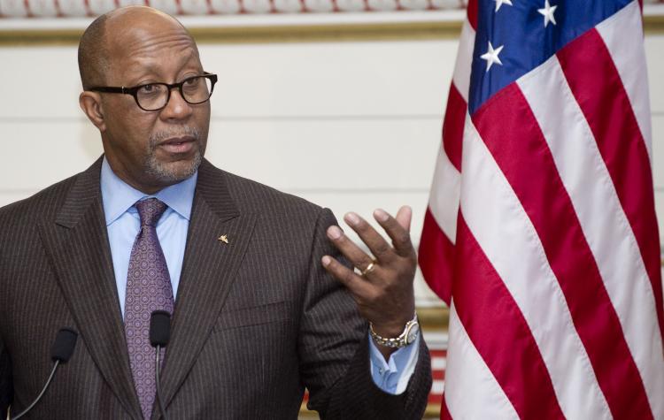 U.S. Trade Representative Ambassador Ron Kirk speaks during a panel discussion in Washington, D.C., on Jan. 13. The U.S. says Canada has been selling lumber for prices below those outlined in the timber pricing system grandfathered under the Softwood Lumb (Saul Loeb/AFP/Getty Images)