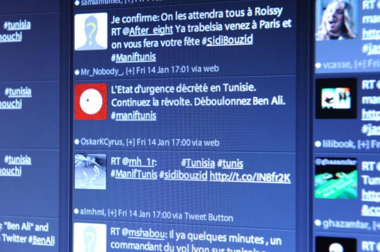 A picture taken on January 14, 2011 in Paris shows a computer screen showing tweets posted by people about the current situation in Tunisia. (Miguel Medina/AFP/Getty Images)