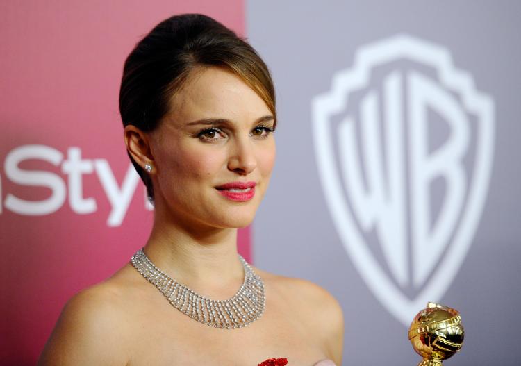 Natalie Portman, winner of the Best Performance By An Actress in a Motion Picture (Drama) award for 'Black Swan'arrives at the 2011 InStyle And Warner Bros. (Kevork Djansezian/Getty Images)