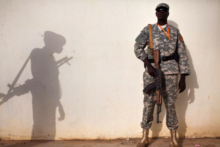 Two members of the Sudanese Liberation Movement stand guard. (Yasuyoshi Chiba/AFP/Getty Images)