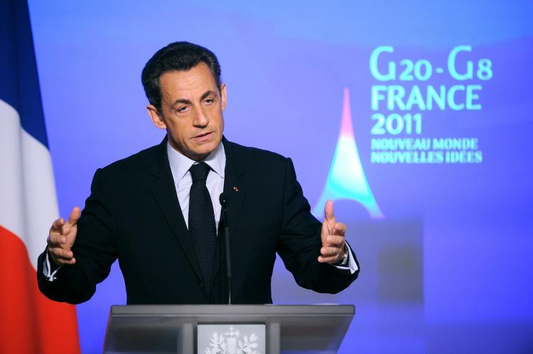 NEW IMAGE: French President Nicolas Sarkozy speaks during a press conference at the presidential Elysee palace Jan. 24 in Paris. (Eric Feferberg/GETTY IMAGES)