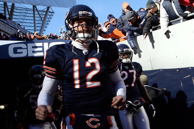 Caleb Hanie #12 of the Chicago Bears runs out of the tunnel to take on the Green Bay Packers during the NFC Championship Game at Soldier Field on January 23, 2011 in Chicago, Illinois.  (Jamie Squire/Getty Images)