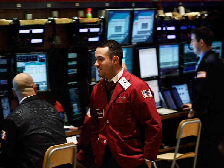 STOCKS SOARING: A view of the New York Stock Exchange floor is seen on Wednesday, Jan. 26. Demand Media's initial public offering on Wednesday was successful as the company's stock jumped more than 33 percent on the day of its IPO. (Chris Hondros/Getty Images )