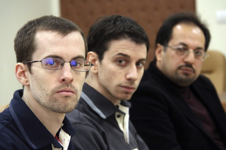 U.S. hikers Shane Bauer (L) and Josh Fattal (C), detained in Iran on spying charges, are sitting next to an unidentified translator during the first session of their trial at the Tehran Revolutionary Court in the Iranian capital on February 6, 2011. (AFP/Getty Images) U.S. hikers Shane Bauer (L) and Josh Fattal (C), detained in Iran on spying charges, are sitting next to an unidentified translator during the first session of their trial at the Tehran Revolutionary Court in the Iranian capital on February 6, 2011. (AFP/Getty Images)