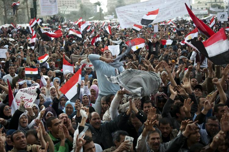 Egyptian anti-government demonstrators chant slogans as tens of thousands gather at Cairo's Tahrir Square on Feb. 10, 2011 amid rumors that embattled President Hosni Mubarak appeared to be on the brink of stepping down. (Pedro Ugarte/AFP/Getty Images)
