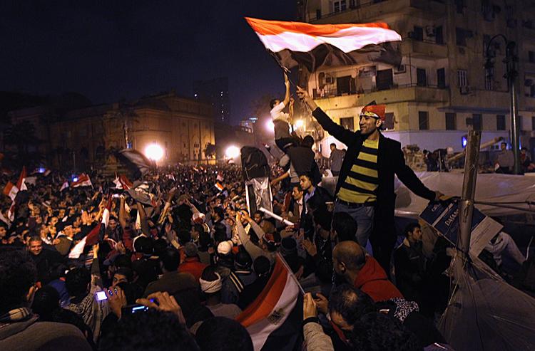 Tahrir Square: Egyptians celebrate after hearing the news of the resignation of Egyptian President Hosni Mubarak on February 11 in Cairo. (John Moore/Getty Images)