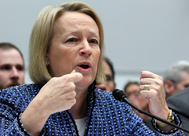 Securities and Exchange Commission (SEC) Chairwoman Mary Schapiro during a hearing on February 15, in Washington. The SEC on Wednesday approved a controversial rule to reward corporate whistleblowers, as part of the Dodd-Frank financial reform legislation. (Mark Wilson/Getty Images)