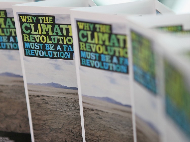 Climate change informational pamphlets are displayed during the Sustainable Living Festival on Feb 18, 2011 in Melbourne. Local communities are taking the initiative to educate themselves about sustainability.  (Marianna Massey/Sustainable Living Festival via Getty Images)
