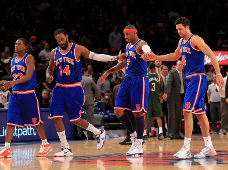 TEAM BALL: Toney Douglas (L) did a good job getting everyone involved in the New York Knicks 107-88 defeat of the New Orleans Hornets on Wednesday night.