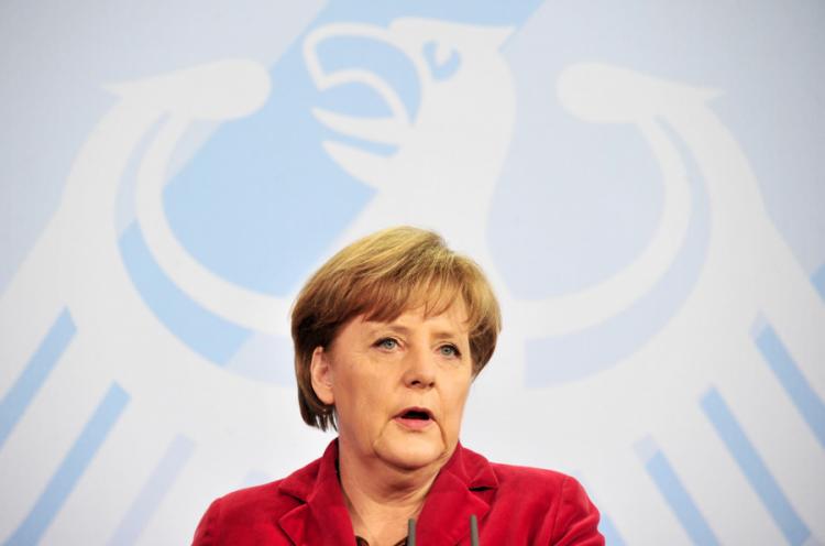 German Chancellor Angela Merkel gives a statement about the resignation earlier in the day of German Defence Minister Karl-Theodor zu Guttenberg (CSU) on March 1, 2011 at the Chancellory in Berlin. (John Macdougall/AFP/Getty Images)
