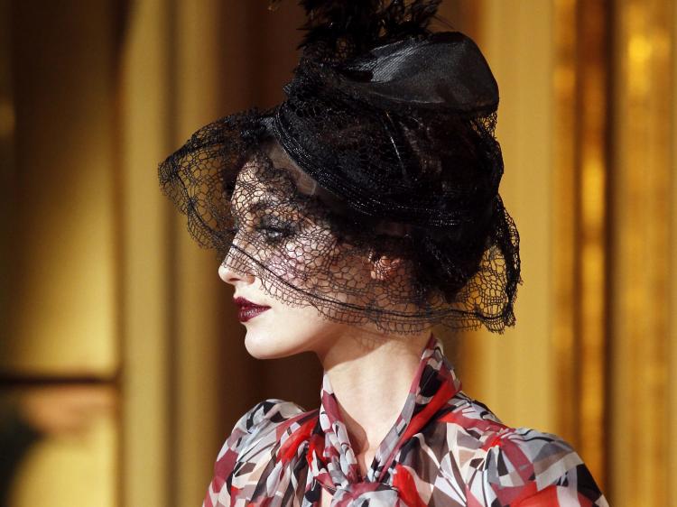 A model presents a creation by British designer John Galliano during the Autumn/Winter 2011-2012 ready-to-wear collection show in Paris. (Francois Guillot/AFP/Getty Images)