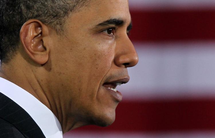 U.S. President Barack Obama speaking at Kenmore Middle School March 14, in Arlington, Vir. Obama warned Libyan leader Moammar Gadhafi on Friday to stop attacks on civilians or face international military retaliation. (Alex Wong/Getty Images)