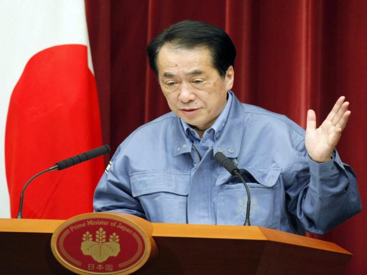 Japanese Prime Minister Naoto Kan speaks at a press conference at the prime minister's official residence in Tokyo on March 15, 2011. Kan told people living up to 10km outside a 20km exclusion zone around a quake-hit nuclear plant to stay indoors. (STR/AFP/Getty Images)