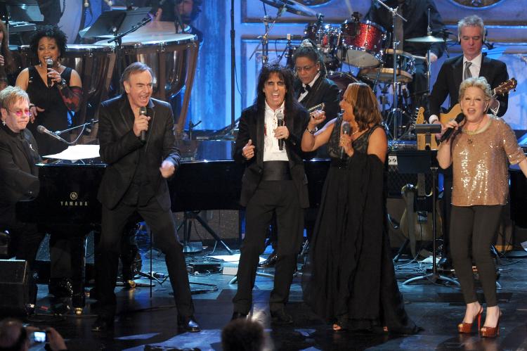 Sir Elton John, inductees Neil Diamond, Alice Cooper and Darlene Love and singer Bette Midler perform onstage at the 26th annual Rock and Roll Hall of Fame Induction Ceremony at The Waldorf=Astoria on March 14, 2011 in New York City. (Michael Loccisano/Getty Images)