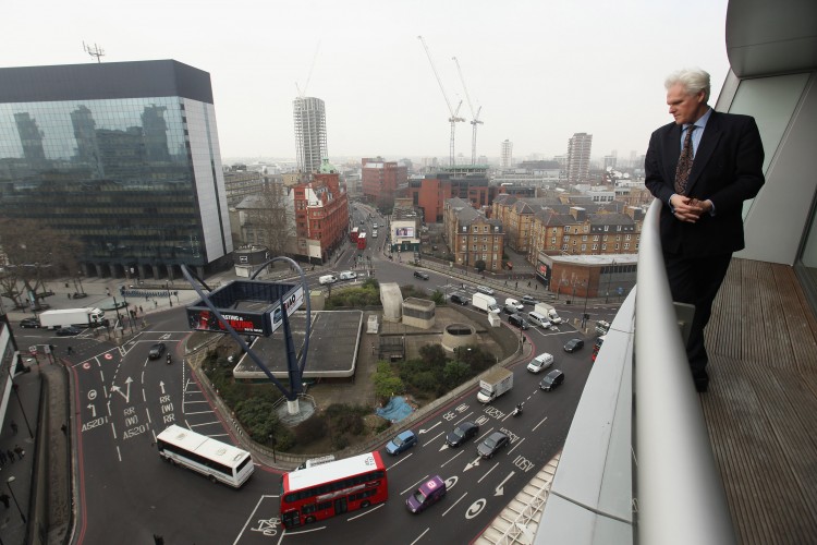 SILICON ROUNDABOUT: A man looks out over the Old Street roundabout in Shoreditch, London, on March 15. The area has been dubbed 'Silicon Roundabout' due to the concentration of technology companies operating there. (Oli Scarff/Getty Images)