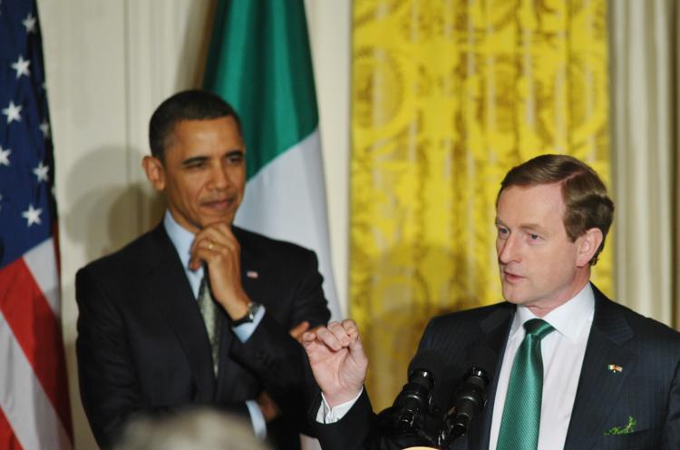 Irish Taoiseach (Prime Minister) Enda Kenny speaks as US President Barack Obama looks on during a St. Patrickâ��s Day reception March 17, 2011 in the East Room of the White House in Washington, DC (MANDEL NGAN/AFP/Getty Images)