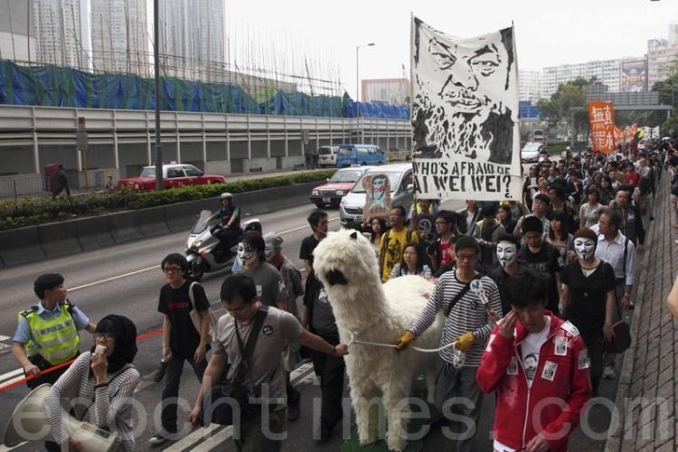The large stuffed animal is a 'grass mud horse,' a homophone for a four-letter word created by Chinese bloggers to evade Internet censors when swearing at the government. Hong Kong, April 23, 2011.  (Pan Zaishu/The Epoch Times)