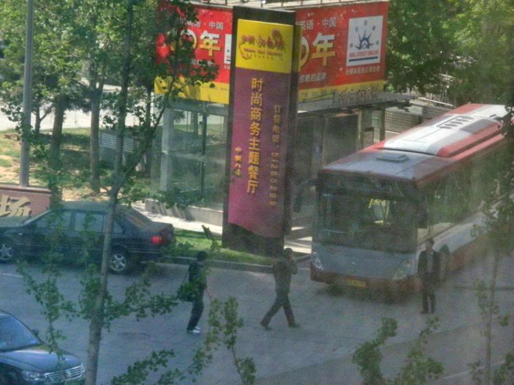 Police cars and bus are parked near Shouwang Church worship site in Beijing, ready to take church members away, April 24. (Photo provided by an anonymous insider)