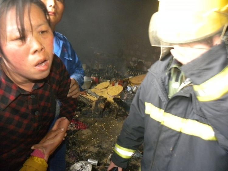 A hastily taken photograph of the scene of the forced demolition on May 13, when a villager was allegedly murdered by a wrecking crew hired by the authorities, in Luzhuang village, Guanyun County of Jiangsu Province. Authorities later said he had committed suicide. (Provided by a source inside China)