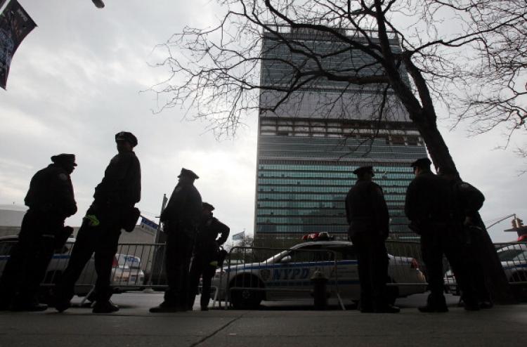 New York Police Department officers stand outside United Nations headquarters during a dirty bomb exercise on April 5, 2011 in New York City. Officers from 150 law enforcement and first responder agencies are conducting the five-day, three-state exercise to evaluate responses to a hypothetical radiological bomb. (Mario Tama/Getty Images)