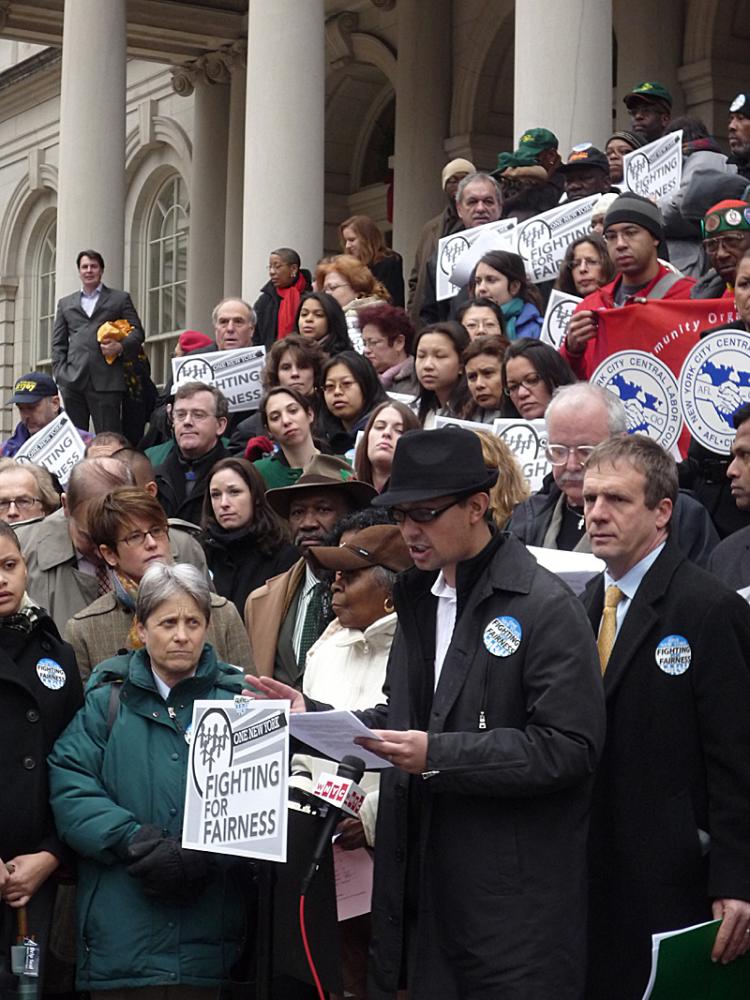 CHANGE: A coalition of 200-plus community organizations are calling on the City and State to raise taxes on the rich instead of cutting services to the poor.  (Christine Lin/The Epoch Times)